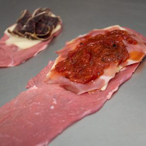 Cachopo jamón serrano, queso emmental y pimiento caramelizado
